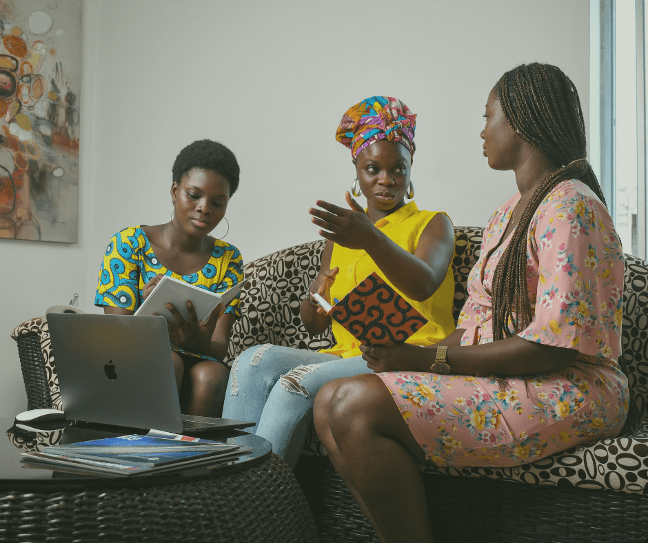 Women looking at laptop together