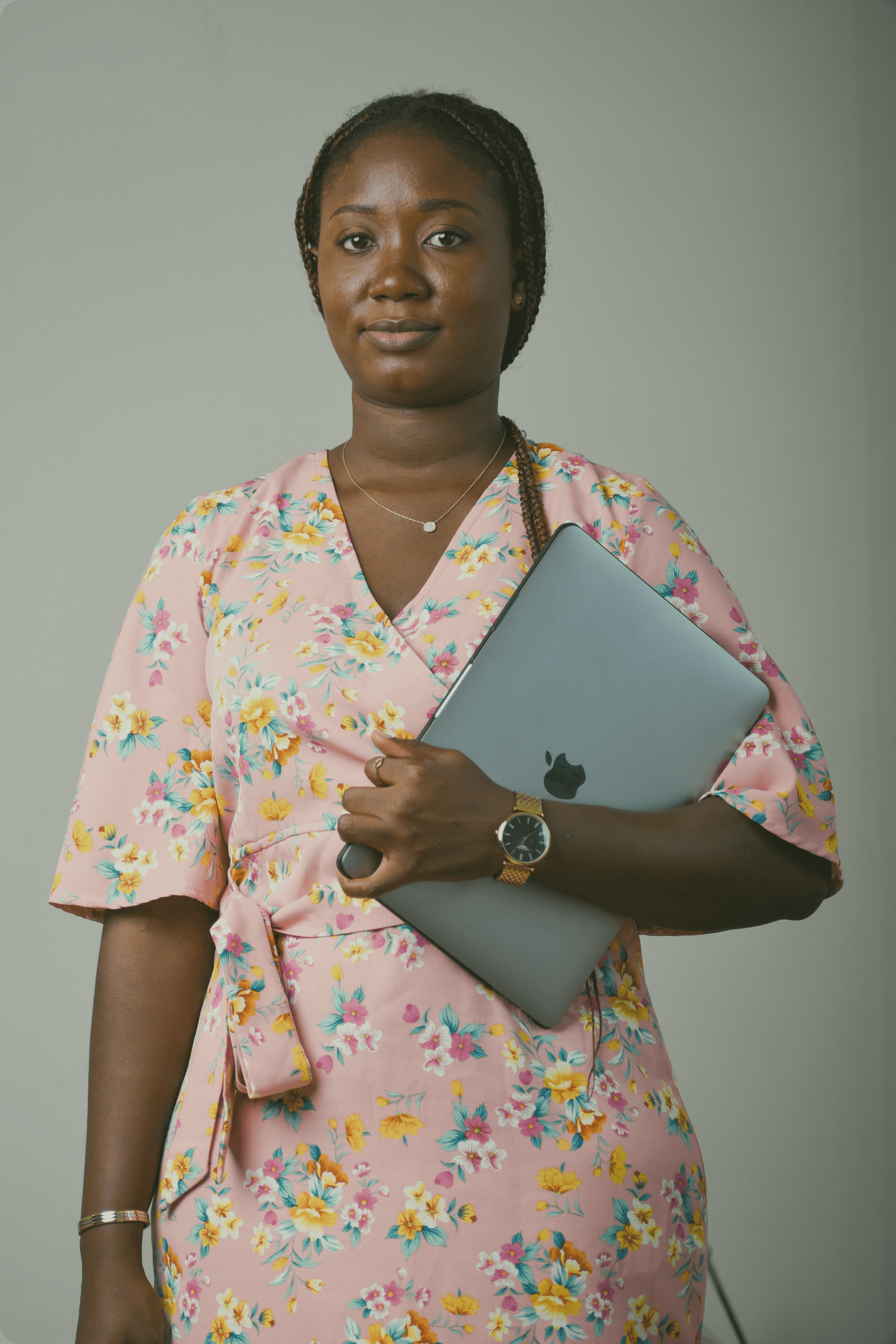 Professional woman holding laptop